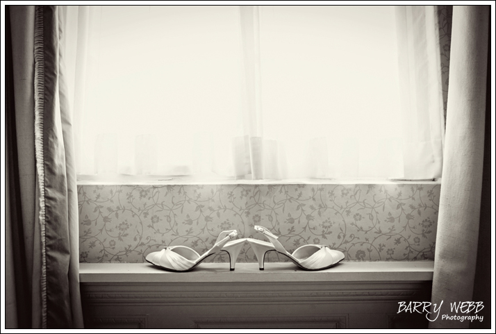 The brides shoes at Brandshatch Place Hotel in Kent - Wedding Photography