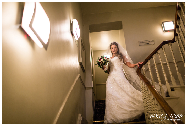 The Bride decending the stairs at rands Hatch Place