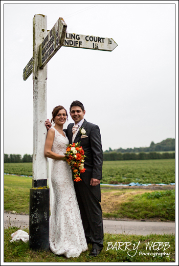 Bride and Groom at Cooling Castle Sign Post
