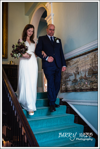 Coming down the stairs with her father at Chiddingstone Castle