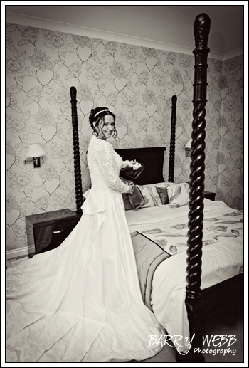 Posing in the bridal suite at Hadlow Manor Hotel in Kent