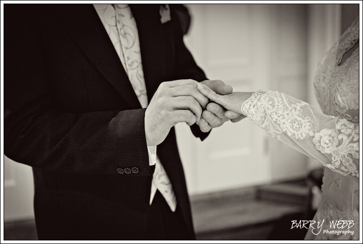 Exchanging rings at Hadlow Manor Hotel in Kent
