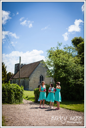 Bridesmaids wait at Waltham Church in Kent