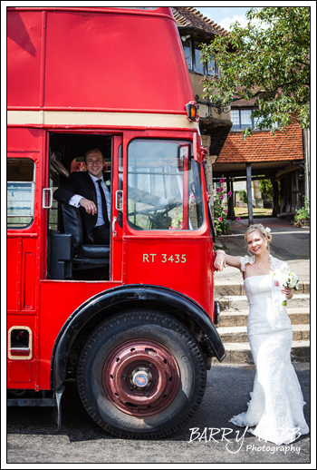 Posing with the wedding bus