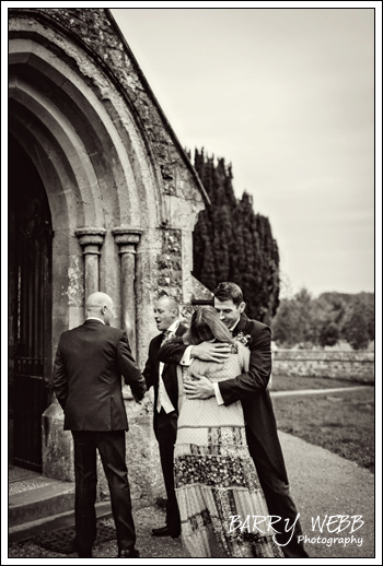 Greeting Guests - Wedding at St Giles' Church in Shipboourne