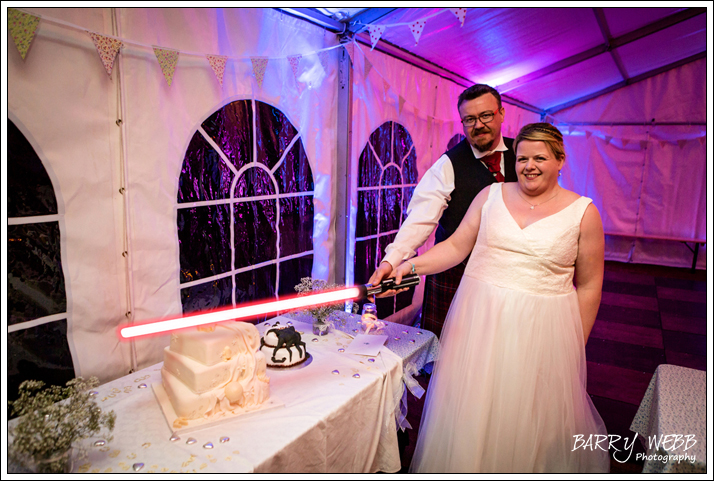 Lightsabre cutting the cake